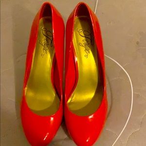 Red heels used twice little stains on the bottom